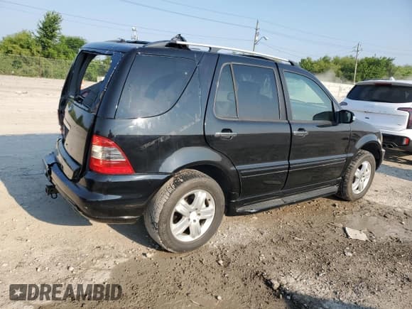 ✅ 2005 Mercedes-Benz M 500 • VIN: 4JGAB75E95A525115 • Lot: 60524995. Listed on Copart with 527,276 mi. Free auction sales archive from the USA and detailed vehicle history report at DreamBid. Image 3.