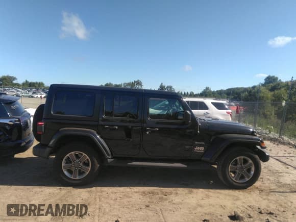 ✅ 2021 Jeep Wrangler Unlimited Sahara • VIN: 1C4HJXEG4MW506447 • Lot: 37418105. Listed on IAAI with 38,973 mi. Free auction sales archive from the USA and detailed vehicle history report at DreamBid. Image 13.