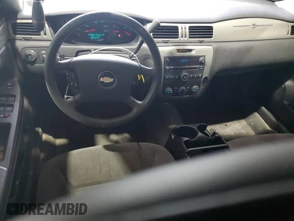 2013 Chevrolet Impala Police with VIN 2G1WD5E36D1267533, listed as a Copart auction lot 48659915 with 72,716 mi miles and Salvage title. Bid and sale history available at DreamBid. Image 8.