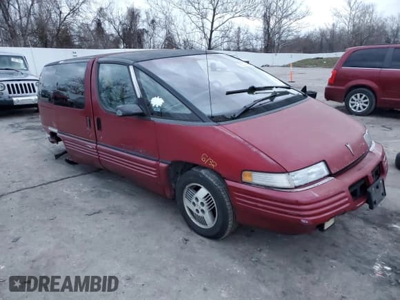 ✅ 1990 Pontiac Trans Sport • VIN: 1GMCU06DXLT200605 • Lot: 85224494. Listed on Copart with 178,493 mi. Free auction sales archive from the USA and detailed vehicle history report at DreamBid. Image 4.