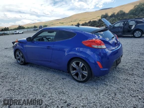✅ 2014 Hyundai Veloster • VIN: KMHTC6AD7EU209823 • Lot: 66675785. Listed on Copart with 104,123 mi. Free auction sales archive from the USA and detailed vehicle history report at DreamBid. Image 2.