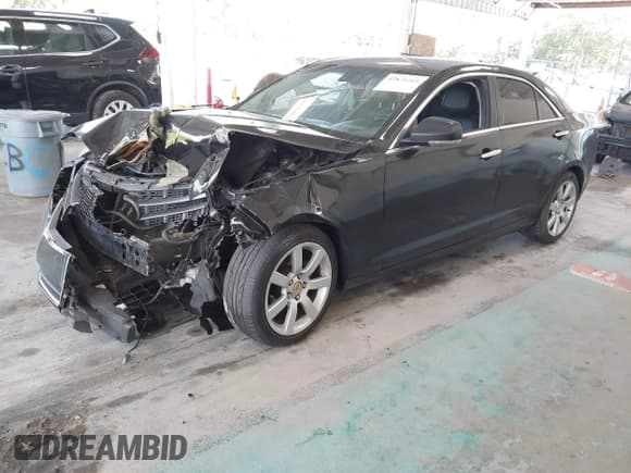 ✅ 2014 Cadillac ATS Standard RWD • VIN: 1G6AA5RA0E0171142 • Lot: 42871265. Listed on IAAI with 137,329 mi. Free auction sales archive from the USA and detailed vehicle history report at DreamBid. Image 2.