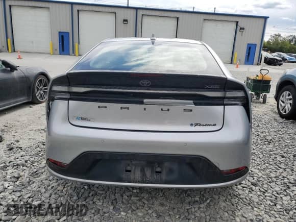 2024 Toyota Prius SE с VIN JTDACACUXR3012846, выставлен на аукционе Copart как лот 69588405 с пробегом 23 184 миль миль и Списание • Salvage title. История ставок и продаж доступна на DreamBid. Изображение 6.