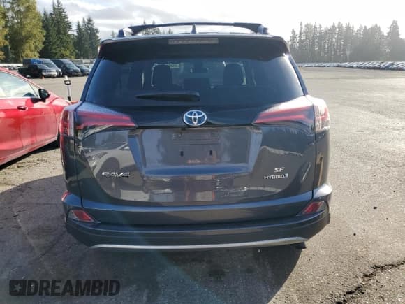 ✅ 2018 Toyota RAV4 Hybrid SE • VIN: JTMJJREV1JD229503 • Lot: 85352365. Listed on Copart with Not provided. Free auction sales archive from the USA and detailed vehicle history report at DreamBid. Image 6.