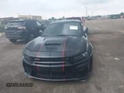 ✅ 2021 Dodge Charger Scat Pack Widebody • VIN: 2C3CDXGJ0MH562401 • Lot: 42597314. Wystawiony na IAAI z przebiegiem 17 769 mil. Bezpłatny archiwum sprzedaży aukcyjnych z USA i szczegółowy raport historii pojazdu na DreamBid. Zdjęcie 12.