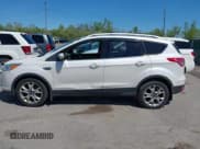✅ 2015 Ford Escape Titanium • VIN: 1FMCU0J91FUA50191 • Lot: 42219288. Listed on IAAI with 159,886 mi. Free auction sales archive from the USA and detailed vehicle history report at DreamBid. Image 14.