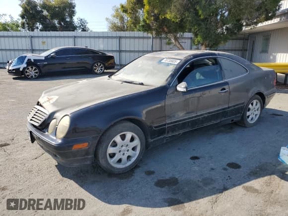 ✅ 2001 Mercedes-Benz CLK 320/430 • VIN: WDBLJ65G01F183917 • Лот: 70735805. Опубликован ранее на Copart с пробегом 88 979 миль. Бесплатный доступ к архиву аукционных продаж из США и подробный отчёт об истории автомобиля на DreamBid. Изображение 1.