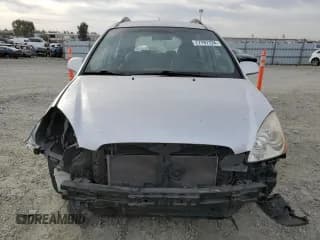 ✅ 2009 Kia Rondo LX • VIN: KNAFG528097222268 • Лот: 77797124. Опубликован ранее на Copart с пробегом 184 569 миль. Бесплатный доступ к архиву аукционных продаж из США и подробный отчёт об истории автомобиля на DreamBid. Изображение 5.