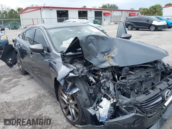✅ 2016 Mazda 6 i Grand Touring • VIN: JM1GJ1W53G1444837 • Lot: 43244802. Wystawiony na IAAI z przebiegiem 132 000 mil. Bezpłatny archiwum sprzedaży aukcyjnych z USA i szczegółowy raport historii pojazdu na DreamBid. Zdjęcie 6.