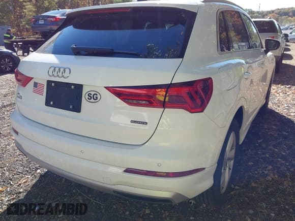 ✅ 2020 Audi Q3 Premium • VIN: WA1AECF31L1120035 • Лот: 43495655. Опубликован ранее на IAAI с пробегом 73 412 миль. Бесплатный доступ к архиву аукционных продаж из США и подробный отчёт об истории автомобиля на DreamBid. Изображение 4.