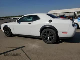 ✅ 2013 Dodge Challenger SXT • VIN: 2C3CDYAG4DH704333 • Lot: 69514464. Wystawiony na Copart z przebiegiem 126 734 mil. Bezpłatny archiwum sprzedaży aukcyjnych z USA i szczegółowy raport historii pojazdu na DreamBid. Zdjęcie 2.