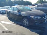 ✅ 2016 Nissan Maxima Platinum • VIN: 1N4AA6APXGC420718 • Lot: 43141870. Wystawiony na IAAI z przebiegiem 182 289 mil. Bezpłatny archiwum sprzedaży aukcyjnych z USA i szczegółowy raport historii pojazdu na DreamBid. Zdjęcie 1.