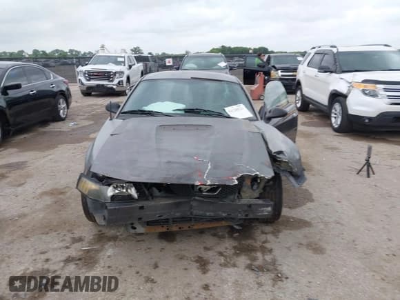 ✅ 2003 Ford Mustang Standard • VIN: 1FAFP40473F383331 • Lot: 42128521. Listed on IAAI with 226,165 mi. Free auction sales archive from the USA and detailed vehicle history report at DreamBid. Image 12.