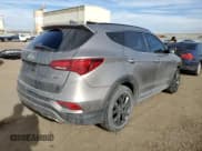 ✅ 2018 Hyundai Santa Fe Ultimate • VIN: 5XYZWDLA2JG505521 • Lot: 36359633. Listed on Copart with 46,847 mi. Free auction sales archive from the USA and detailed vehicle history report at DreamBid. Image 3.