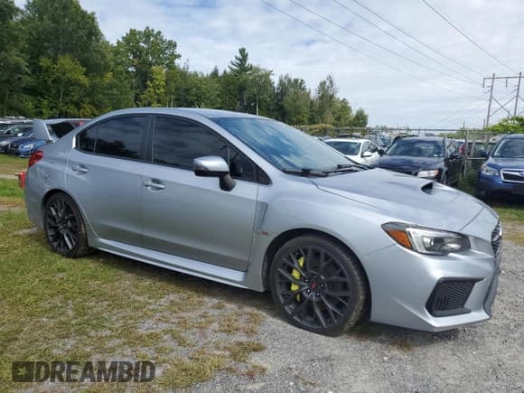 ✅ 2018 Subaru WRX STI • VIN: JF1VA2N60J9823056 • Lot: 80942455. Listed on Copart with 122,825 mi. Free auction sales archive from the USA and detailed vehicle history report at DreamBid. Image 1.