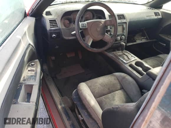 2009 Dodge Challenger SRT-8 z VIN 2B3LJ74W29H569671, wystawiony jako Copart lot #71186264 z przebiegiem Nie podano mil oraz Szkoda całkowita • Salvage title. Historia ofert i sprzedaży dostępna na DreamBid. Obrazek 8.