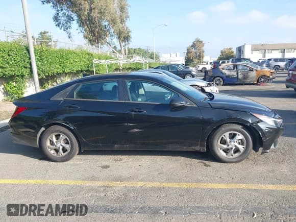 ✅ 2021 Hyundai Elantra SE • VIN: 5NPLL4AG5MH036590 • Lot: 43476534. Listed on IAAI with 70,995 mi. Free auction sales archive from the USA and detailed vehicle history report at DreamBid. Image 13.