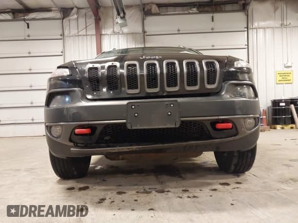 ✅ 2015 Jeep Cherokee Trailhawk • VIN: 1C4PJMBS7FW650340 • Lot: 43755791. Listed on IAAI with 129,855 mi. Free auction sales archive from the USA and detailed vehicle history report at DreamBid. Image 18.