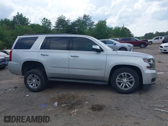 ✅ 2018 Chevrolet Tahoe LT • VIN: 1GNSCBKC3JR112590 • Lot: 42156796. Listed on IAAI with 124,120 mi. Free auction sales archive from the USA and detailed vehicle history report at DreamBid. Image 13.