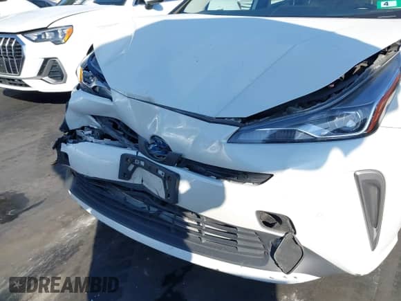 2020 Toyota Prius LE with VIN JTDL9RFU7L3015647, listed as a IAAI auction lot 43500977 with 55,174 mi miles and . Bid and sale history available at DreamBid. Image 6.