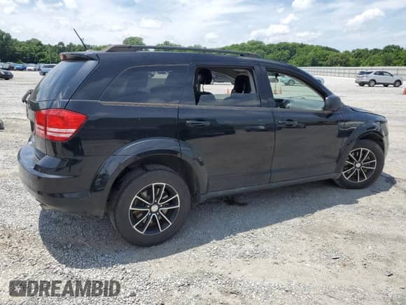 2017 Dodge Journey SE with VIN 3C4PDCAB8HT606195, listed as a Copart auction lot 60147455 with 125,120 mi miles and Salvage title. Bid and sale history available at DreamBid. Image 3.