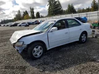 1999 Honda Accord EX with VIN 1HGCG1655XA050416, listed as a Copart auction lot 82207485 with 216,150 mi miles and Salvage title. Bid and sale history available at DreamBid. Image 1.