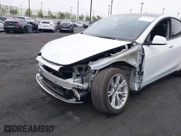 ✅ 2023 Tesla Model Y Long Range • VIN: 7SAYGDEE5PA063097 • Lot: 42171871. Listed on IAAI with Not provided. Free auction sales archive from the USA and detailed vehicle history report at DreamBid. Image 6.