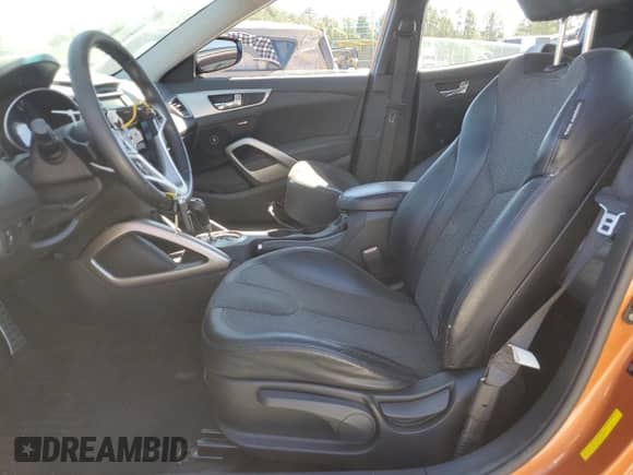 2012 Hyundai Veloster w/Red Int z VIN KMHTC6AD9CU044547, wystawiony jako Copart lot #72633624 z przebiegiem 69 261 mil mil oraz Szkoda całkowita • Salvage title. Historia ofert i sprzedaży dostępna na DreamBid. Obrazek 7.