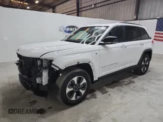 ✅ 2024 Jeep Grand Cherokee • VIN: 1C4RJYB69RC129743 • Lot: 87460235. Wystawiony na Copart z przebiegiem 56 990 mil. Bezpłatny archiwum sprzedaży aukcyjnych z USA i szczegółowy raport historii pojazdu na DreamBid. Zdjęcie 1.