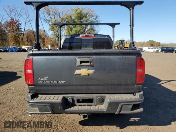 ✅ 2019 Chevrolet Colorado 4WD Z71 • VIN: 1GCGTDEN7K1132221 • Лот: 76713234. Опубликован ранее на Copart с пробегом 129 185 миль. Бесплатный доступ к архиву аукционных продаж из США и подробный отчёт об истории автомобиля на DreamBid. Изображение 6.