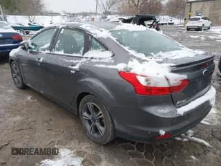 ✅ 2014 Ford Focus SE • VIN: 1FADP3F22EL397553 • Lot: 43678357. Listed on IAAI with 146,970 mi. Free auction sales archive from the USA and detailed vehicle history report at DreamBid. Image 3.