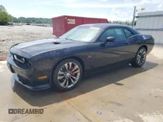 2013 Dodge Challenger SRT-8 с VIN 2C3CDYCJ1DH668254, выставлен на аукционе Copart как лот 62082365 с пробегом 167 320 миль миль и Списание • Salvage title. История ставок и продаж доступна на DreamBid. Изображение 1.