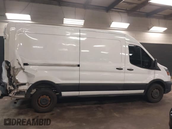 ✅ 2020 Ford Transit Cargo • VIN: 1FTBR1C87LKA59688 • Lot: 41633552. Listed on IAAI with 42,517 mi. Free auction sales archive from the USA and detailed vehicle history report at DreamBid. Image 13.
