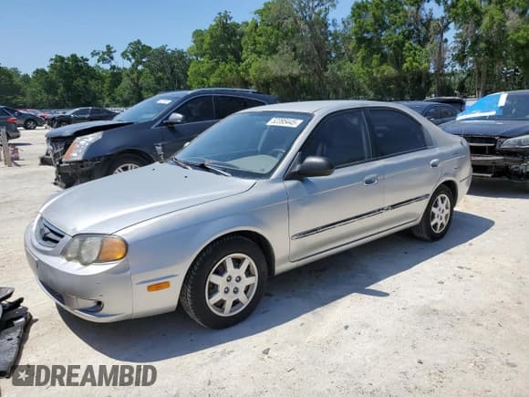 ✅ 2004 Kia Spectra GS • VIN: KNAFB161945141309 • Lot: 52395445. Listed on Copart with 99,100 mi. Free auction sales archive from the USA and detailed vehicle history report at DreamBid. Image 1.