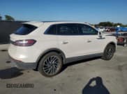 ✅ 2019 Lincoln Nautilus Reserve • VIN: 2LMPJ6L9XKBL11459 • Лот: 90830685. Опубликован ранее на Copart с пробегом 73 719 миль. Бесплатный доступ к архиву аукционных продаж из США и подробный отчёт об истории автомобиля на DreamBid. Изображение 3.