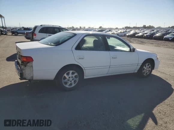 ✅ 2000 Toyota Camry LE • VIN: JT2BG22K8Y0418325 • Лот: 82253695. Опубликован ранее на Copart с пробегом 189 355 миль. Бесплатный доступ к архиву аукционных продаж из США и подробный отчёт об истории автомобиля на DreamBid. Изображение 3.