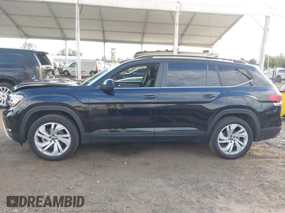 ✅ 2021 Volkswagen Atlas SE • VIN: 1V2JR2CA1MC537991 • Lot: 43704778. Listed on IAAI with 67,761 mi. Free auction sales archive from the USA and detailed vehicle history report at DreamBid. Image 14.