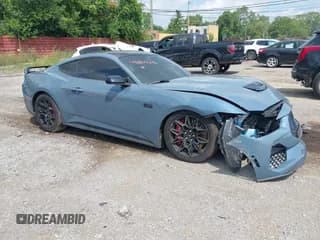 ✅ 2024 Ford Mustang GT • VIN: 1FA6P8CFXR5410556 • Lot: 42814636. Listed on IAAI with 28,267 mi. Free auction sales archive from the USA and detailed vehicle history report at DreamBid. Image 1.