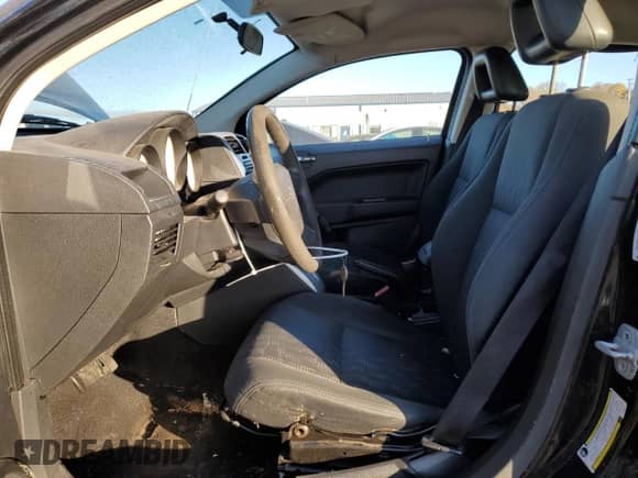 2008 Dodge Caliber SE с VIN 1B3HB28B18D574711, выставлен на аукционе Copart как лот 75298974 с пробегом 133 153 миль миль и Списание • Salvage title. История ставок и продаж доступна на DreamBid. Изображение 7.