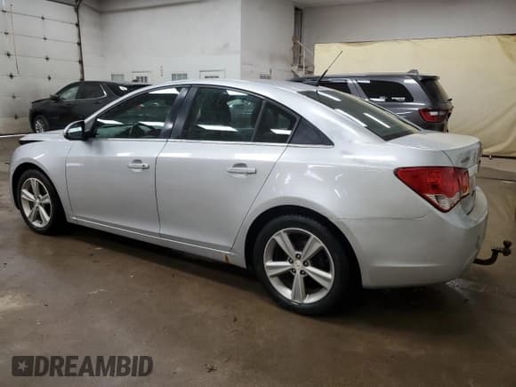 ✅ 2014 Chevrolet Cruze 2LT • VIN: 1G1PE5SB0E7409408 • Lot: 86823525. Listed on Copart with 203,056 mi. Free auction sales archive from the USA and detailed vehicle history report at DreamBid. Image 2.