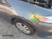 ✅ 2012 Honda Insight • VIN: JHMZE2H37CS006050 • Lot: 42570827. Listed on IAAI with 198,105 mi. Free auction sales archive from the USA and detailed vehicle history report at DreamBid. Image 6.