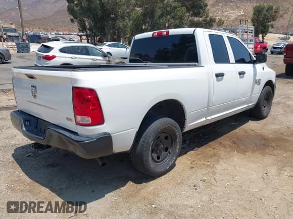 ✅ 2019 Ram 1500 Tradesman • VIN: 1C6RR6FG2KS719656 • Lot: 42737371. Listed on IAAI with 131,256 mi. Free auction sales archive from the USA and detailed vehicle history report at DreamBid. Image 4.
