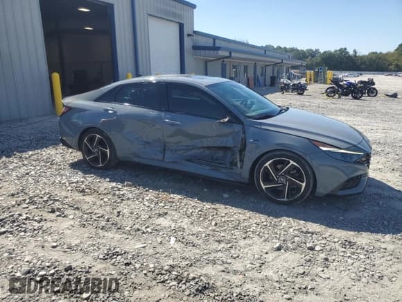 ✅ 2022 Hyundai Elantra N Line • VIN: KMHLR4AF6NU303762 • Lot: 84449665. Listed on Copart with 67,472 mi. Free auction sales archive from the USA and detailed vehicle history report at DreamBid. Image 4.