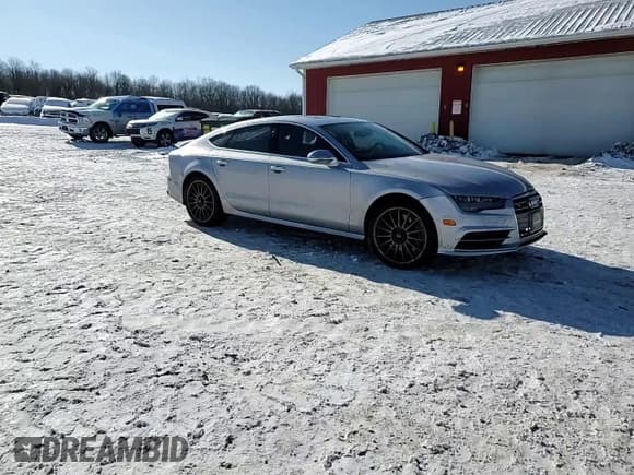 ✅ 2017 Audi S7 Premium Plus • VIN: WAUWFAFC1HN026473 • Лот: 42178505. Опубликован ранее на Copart с пробегом 70 397 миль. Бесплатный доступ к архиву аукционных продаж из США и подробный отчёт об истории автомобиля на DreamBid. Изображение 14.