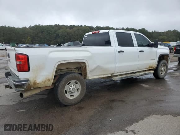 ✅ 2018 GMC Sierra 2500HD • VIN: 1GT12REY5JF202154 • Лот: 79009504. Опубликован ранее на Copart с пробегом 248 716 миль. Бесплатный доступ к архиву аукционных продаж из США и подробный отчёт об истории автомобиля на DreamBid. Изображение 3.