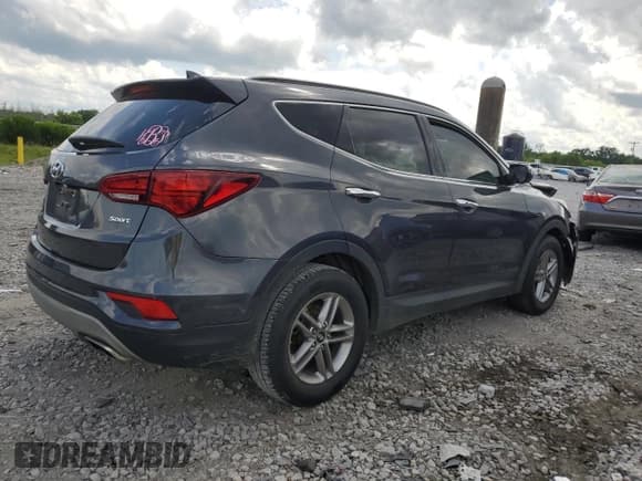 ✅ 2018 Hyundai Santa Fe 2.4L • VIN: 5XYZU3LB3JG507173 • Лот: 57380424. Опубликован ранее на Copart с пробегом 94 036 миль. Бесплатный доступ к архиву аукционных продаж из США и подробный отчёт об истории автомобиля на DreamBid. Изображение 3.