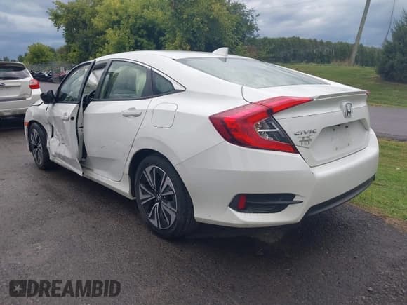 ✅ 2018 Honda Civic EX-T • VIN: JHMFC1F3XJX002306 • Lot: 43149201. Listed on IAAI with 77,470 mi. Free auction sales archive from the USA and detailed vehicle history report at DreamBid. Image 3.