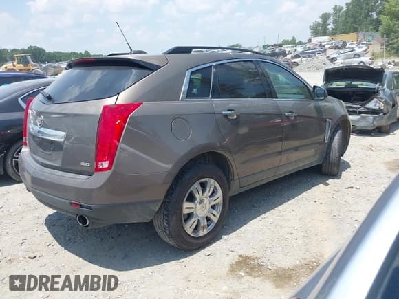 ✅ 2015 Cadillac SRX • VIN: 3GYFNAE35FS542016 • Лот: 42669025. Опубликован ранее на IAAI с пробегом 197 830 миль. Бесплатный доступ к архиву аукционных продаж из США и подробный отчёт об истории автомобиля на DreamBid. Изображение 4.
