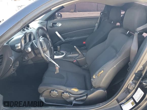 ✅ 2007 Nissan 350Z • VIN: JN1BZ34D77M504242 • Lot: 76409154. Wystawiony na Copart z przebiegiem 142 370 mil. Bezpłatny archiwum sprzedaży aukcyjnych z USA i szczegółowy raport historii pojazdu na DreamBid. Zdjęcie 7.