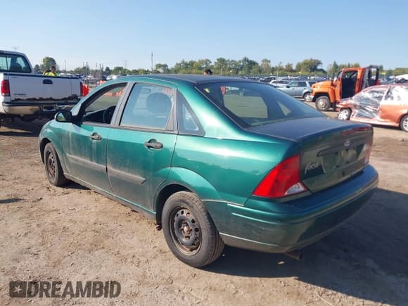 ✅ 2001 Ford Focus LX • VIN: 1FAFP33P31W155548 • Лот: 43188169. Опубликован ранее на IAAI с пробегом 80 552 миль. Бесплатный доступ к архиву аукционных продаж из США и подробный отчёт об истории автомобиля на DreamBid. Изображение 3.